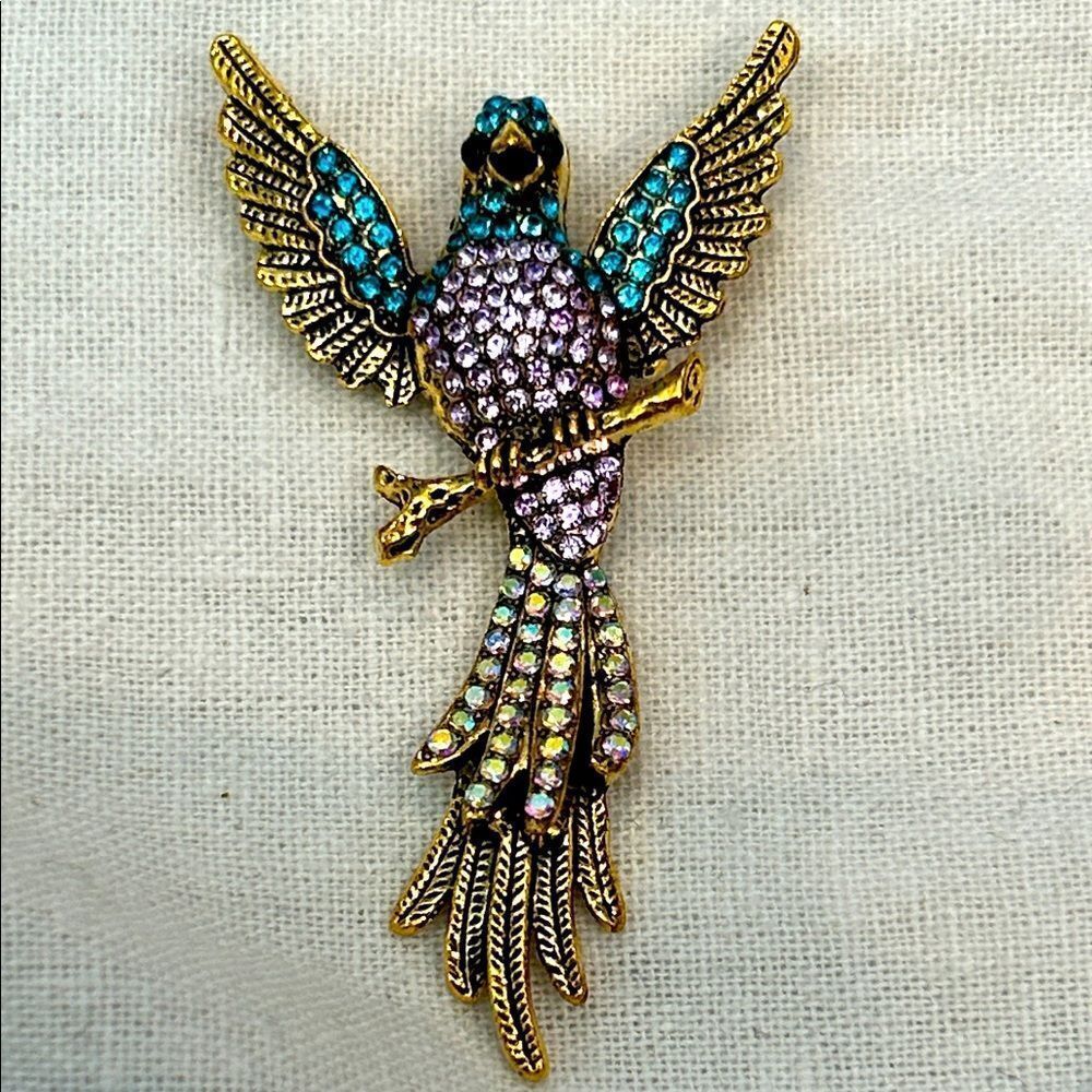 Elegant Gold and Blue Bird Brooch